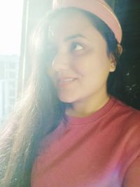 Portrait of a smiling young woman