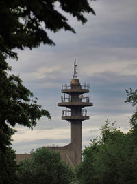 View of tower against cloudy sky