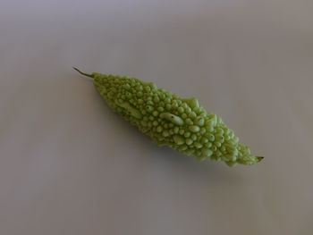 Close-up of bananas over white background