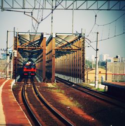 Railroad tracks against clear sky