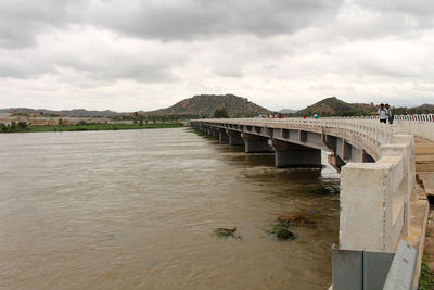 Bridge over river against sky