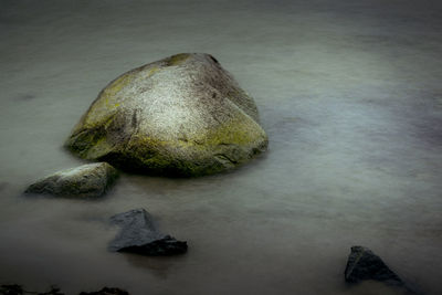 Close-up of rock in water