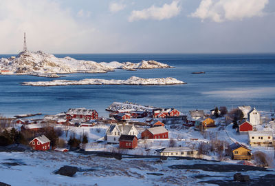 Scenic view of sea against sky during winter