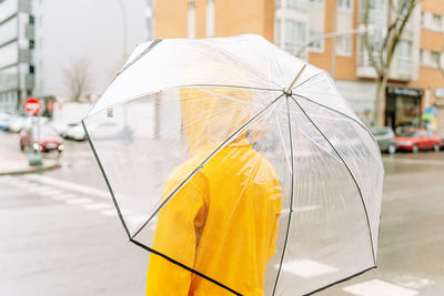 Close-up of umbrella on street