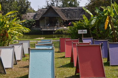 Houses and table by trees and house in yard