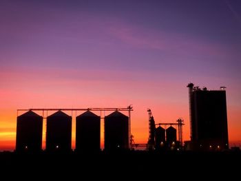 Silhouette of buildings at dusk