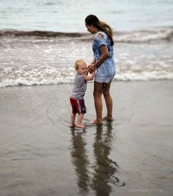 Full length of boy on beach