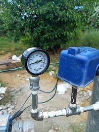 Close-up of vintage car on field