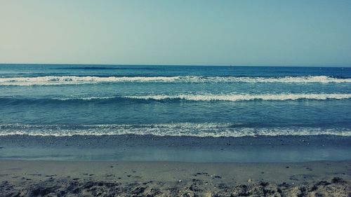 Scenic view of sea against clear sky