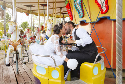 People sitting at amusement park