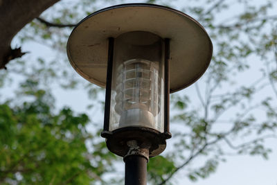 Low angle view of street light against sky