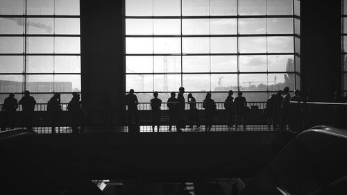 Silhouette people in waiting room at ostkreuz