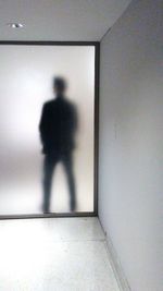 Shadow of man on door