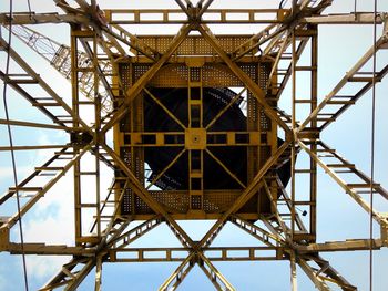 Low angle view of metal structure against sky