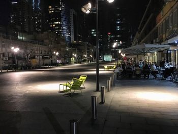 Illuminated street at night