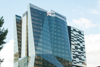 Low angle view of modern building against sky