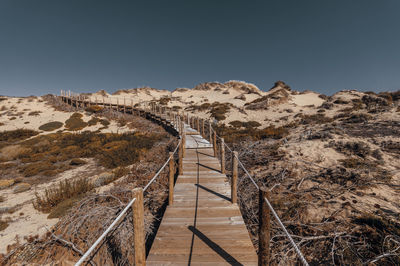 Empty boardwalk at desert