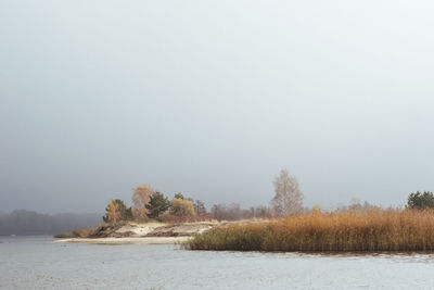 Scenic view of lake against clear sky