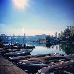 Boats moored at harbor