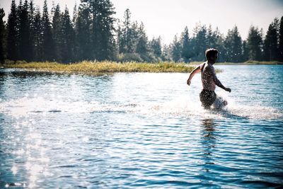 Man running in manzanita lake