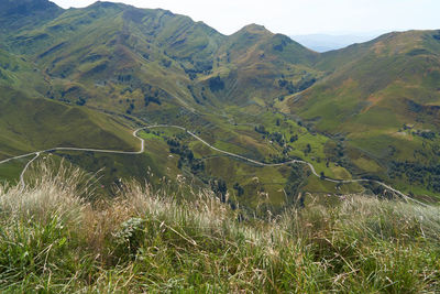 Scenic view of landscape and mountains against sky