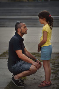 Side view of couple smiling