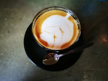 High angle view of cappuccino on table