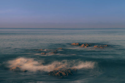 Scenic view of sea against clear sky