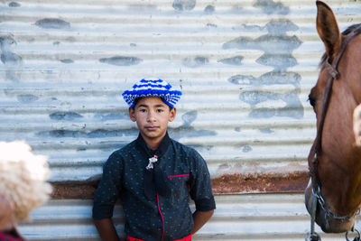 Portrait of young argentinian boy wearing traditional clothing