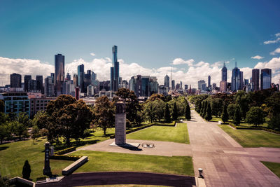 View of trees and buildings in city