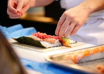 Close-up of person preparing food