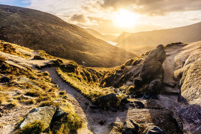 Scenic view of mountains against sky during sunset