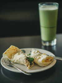 Close-up of breakfast served on table