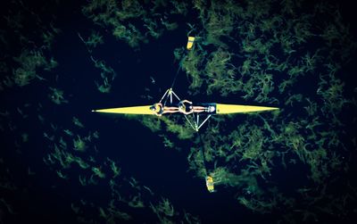 Directly above shot of people kayaking in river