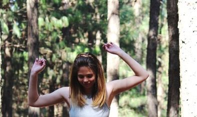 Portrait of young woman in a forest