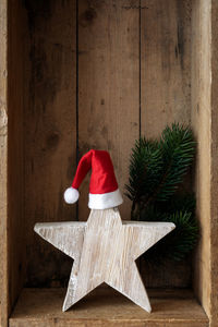 Close-up of christmas decorations on shelf