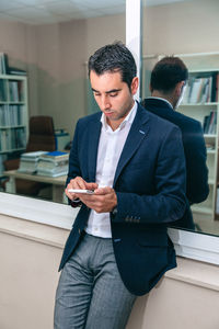 Young man using mobile phone