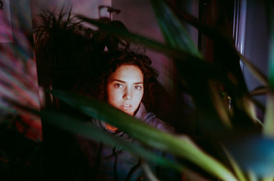 Portrait of young woman looking away