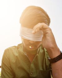 Close-up of man with blindfold