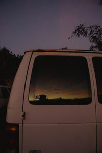 Reflection of sky on car window