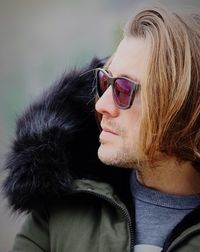 Close-up portrait of smiling young woman