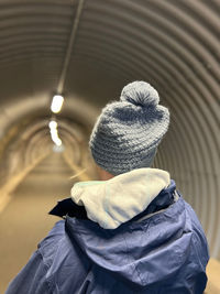 Woman in an empty tunnel