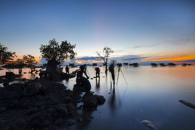 Scenic view of sea at sunset