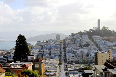 High angle shot of townscape against calm sea