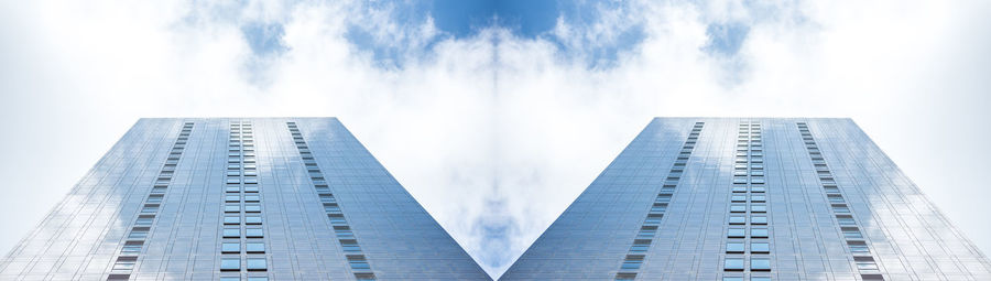 Low angle view of modern buildings against sky