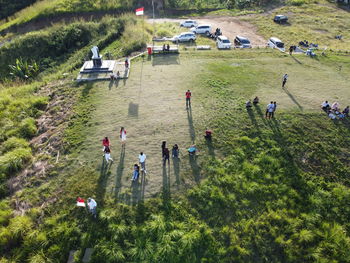 High angle view of people on field