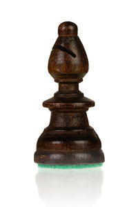 Close-up of chess pieces against white background