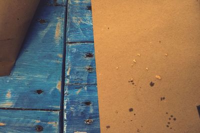 Close-up of wood on beach