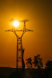 Low angle view of silhouette tree against sky during sunset