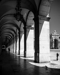 Man in corridor of building